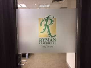 Ryman window etch signage